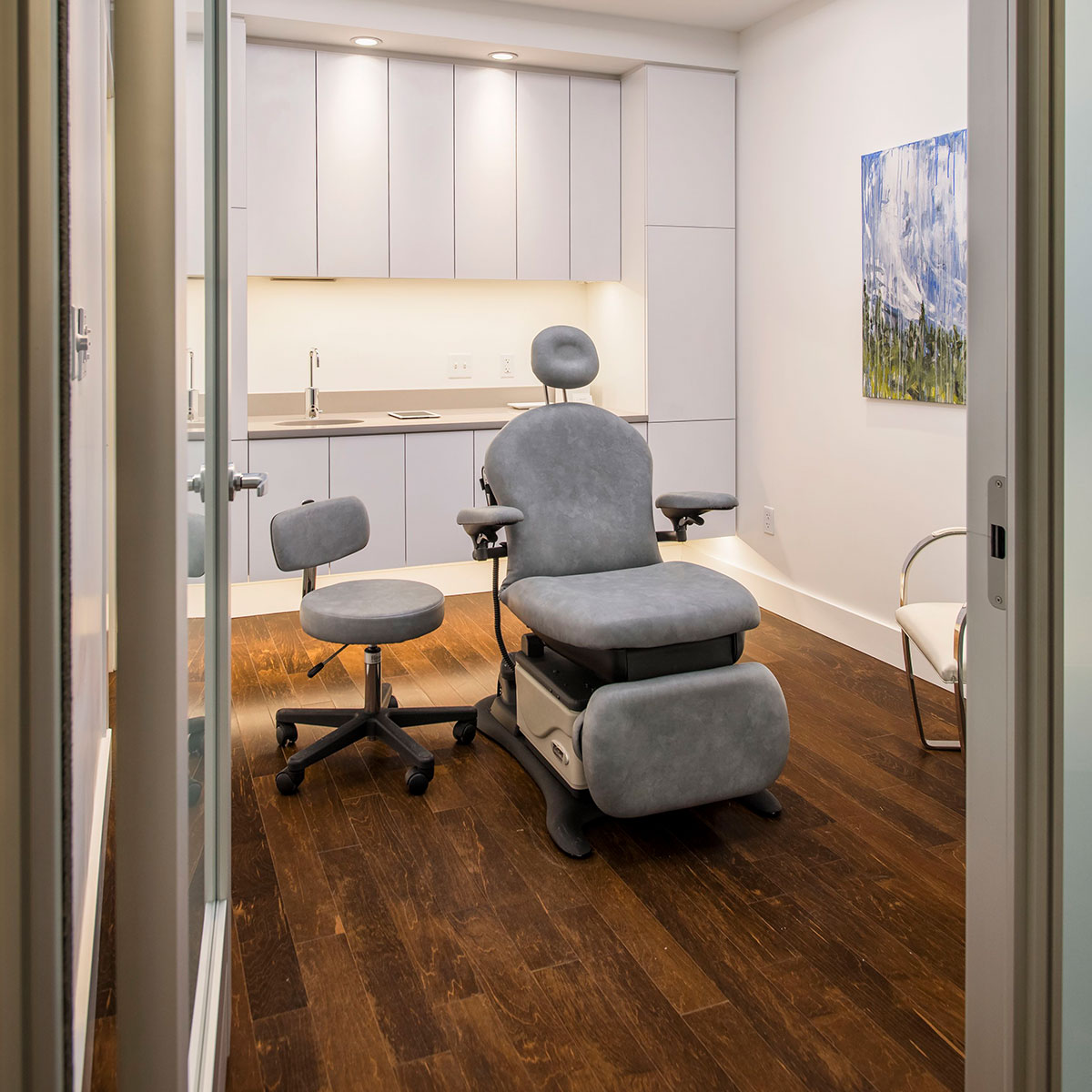 Room with procedure chair for client.