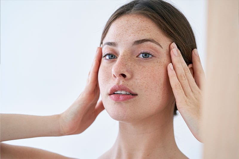 woman after getting a rhinoplasty in Boston, MA