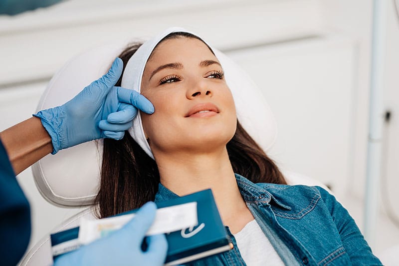 young woman getting dermal fillers in Boston, MA